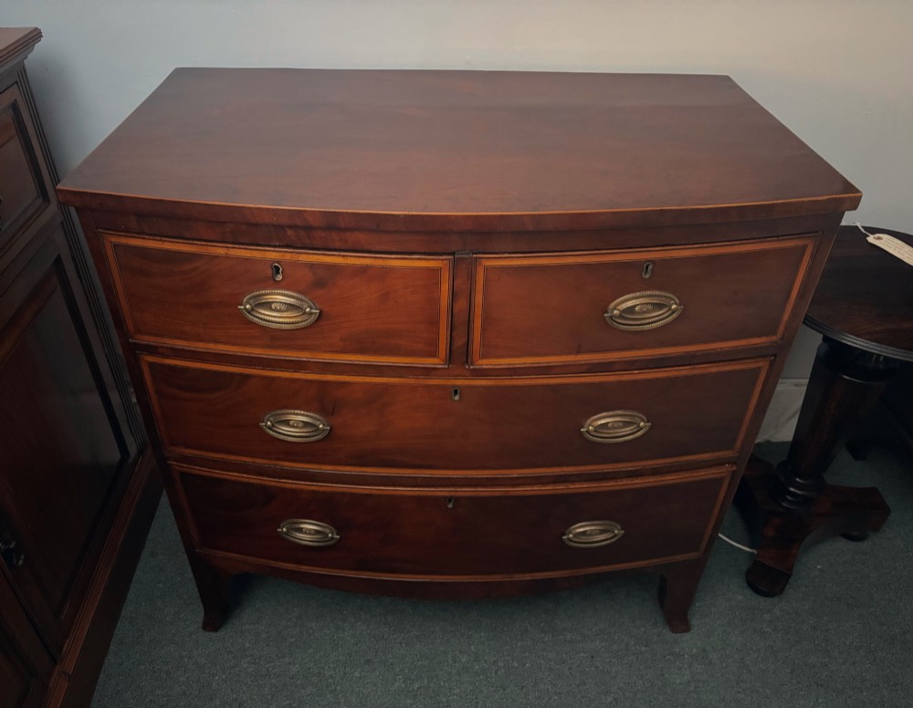 Regency mahogany small bow front chest of drawers View VIII