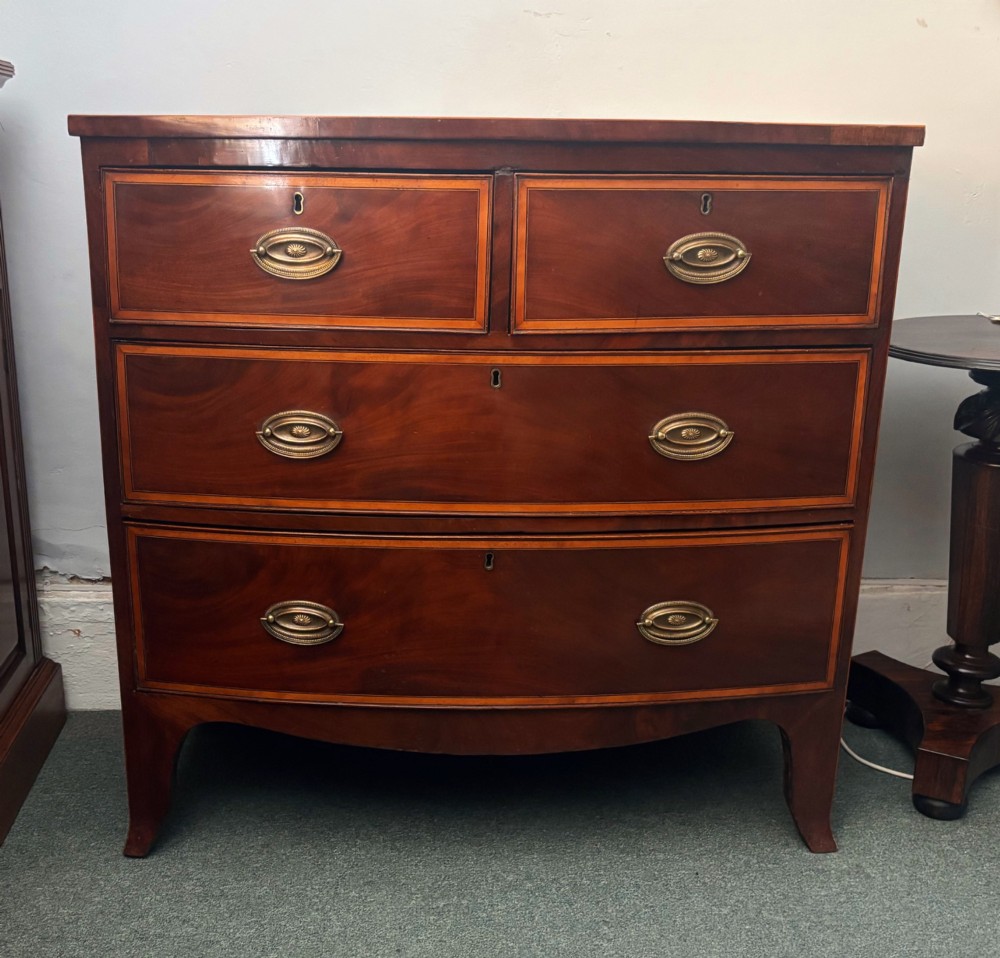 Regency mahogany small bow front chest of drawers View X
