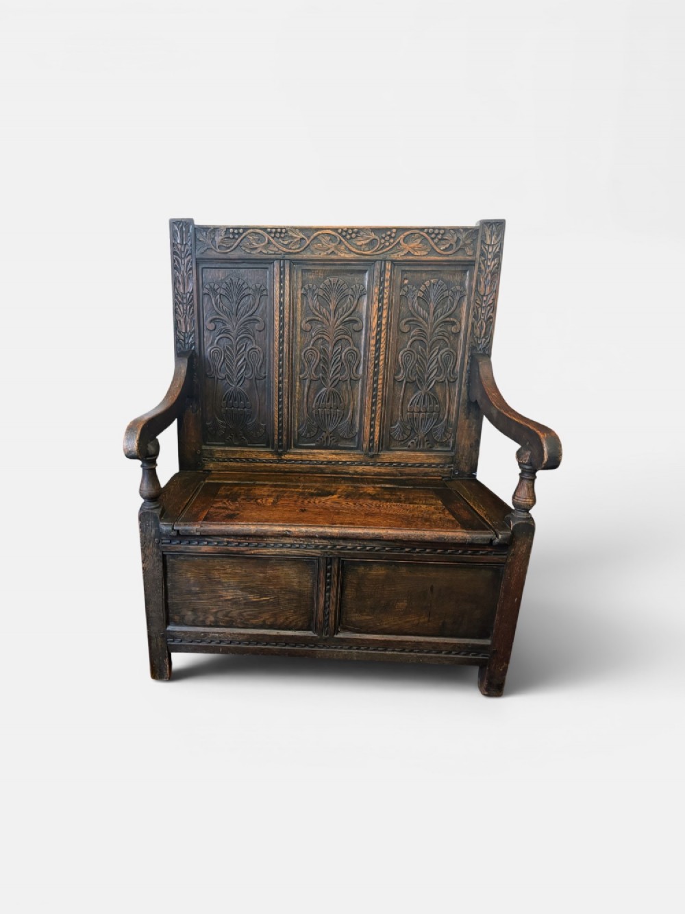 Small Victorian carved oak settle View II