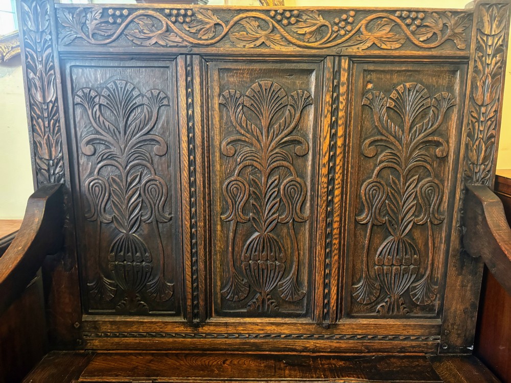 Small Victorian carved oak settle View III