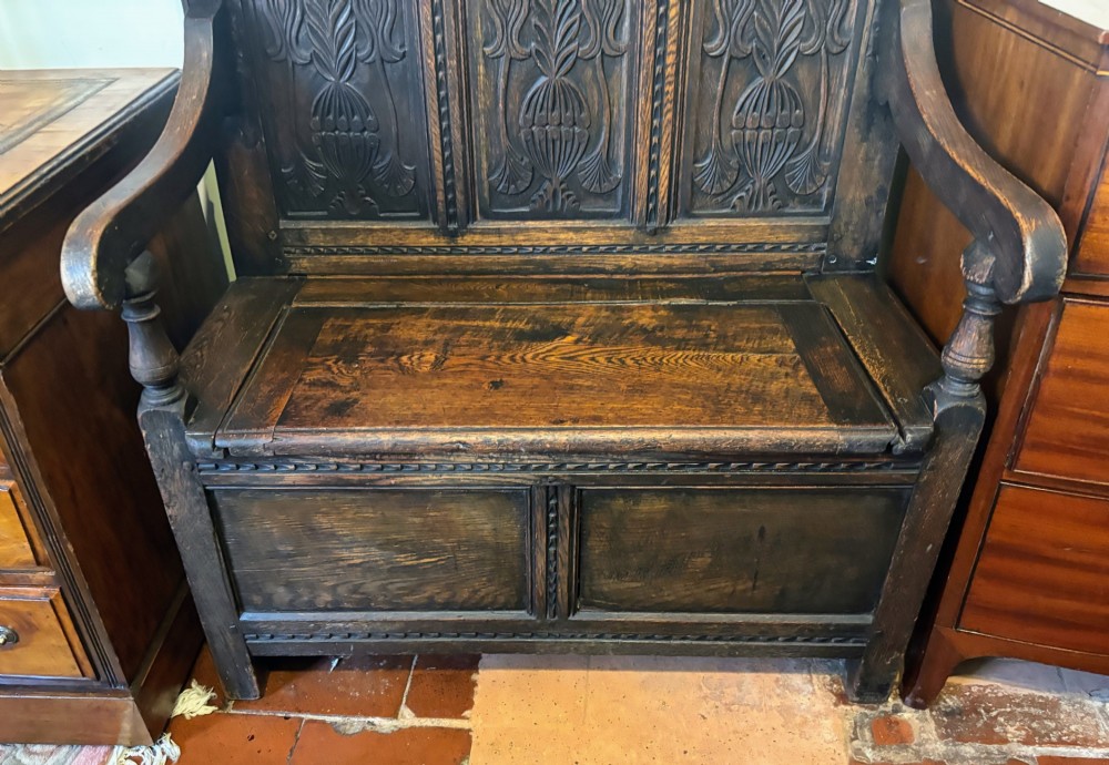 Small Victorian carved oak settle View IV