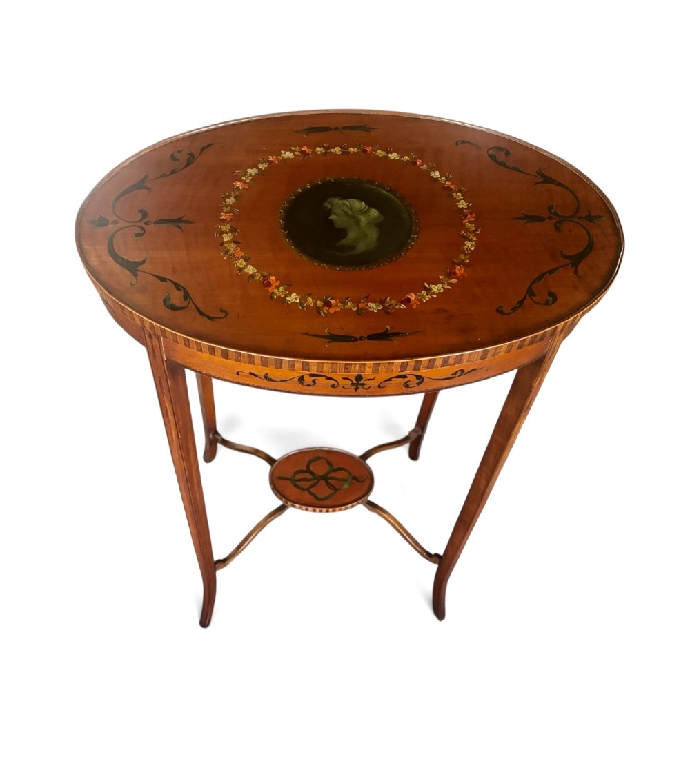 Edwardian satinwood occasional table with painted floral decoration