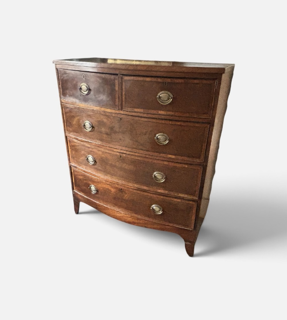 Regency mahogany and satinwood crossbanded bow front chest of drawers