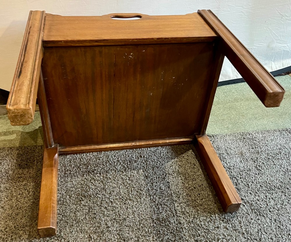 An early 20th-century mahogany low table featuring a raised gallery rim with integrated hand-holds and reeded square legs. View VIII