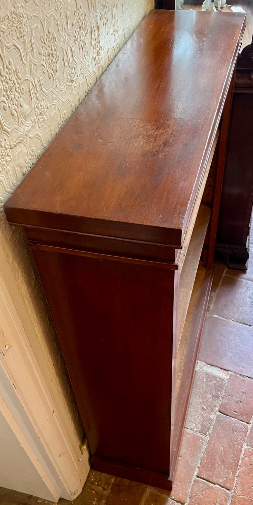 A Victorian open mahogany bookcase featuring three open timber shelves, a simple moulded top, and a plinth base. View IV
