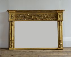 A WILLIAM IV GILTWOOD OVERMANTEL MIRROR