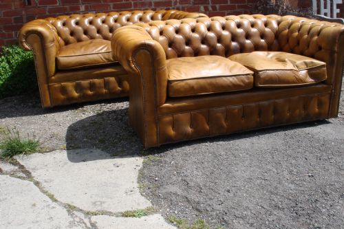 Pair of Leather Chesterfield Sofas