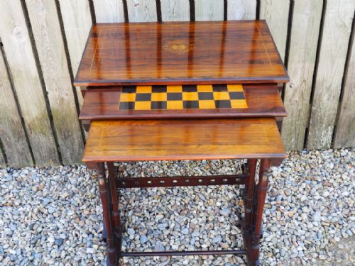 Nest of Three Rosewood Tables