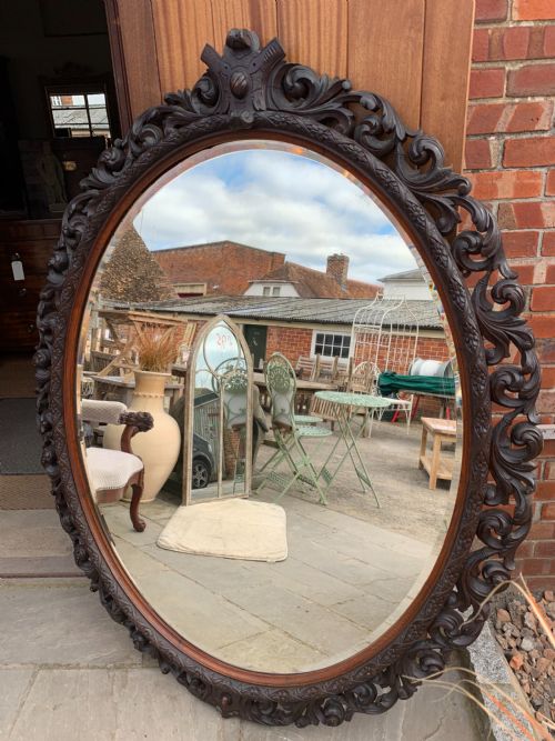 Very Large Carved Oak Oval Mirror