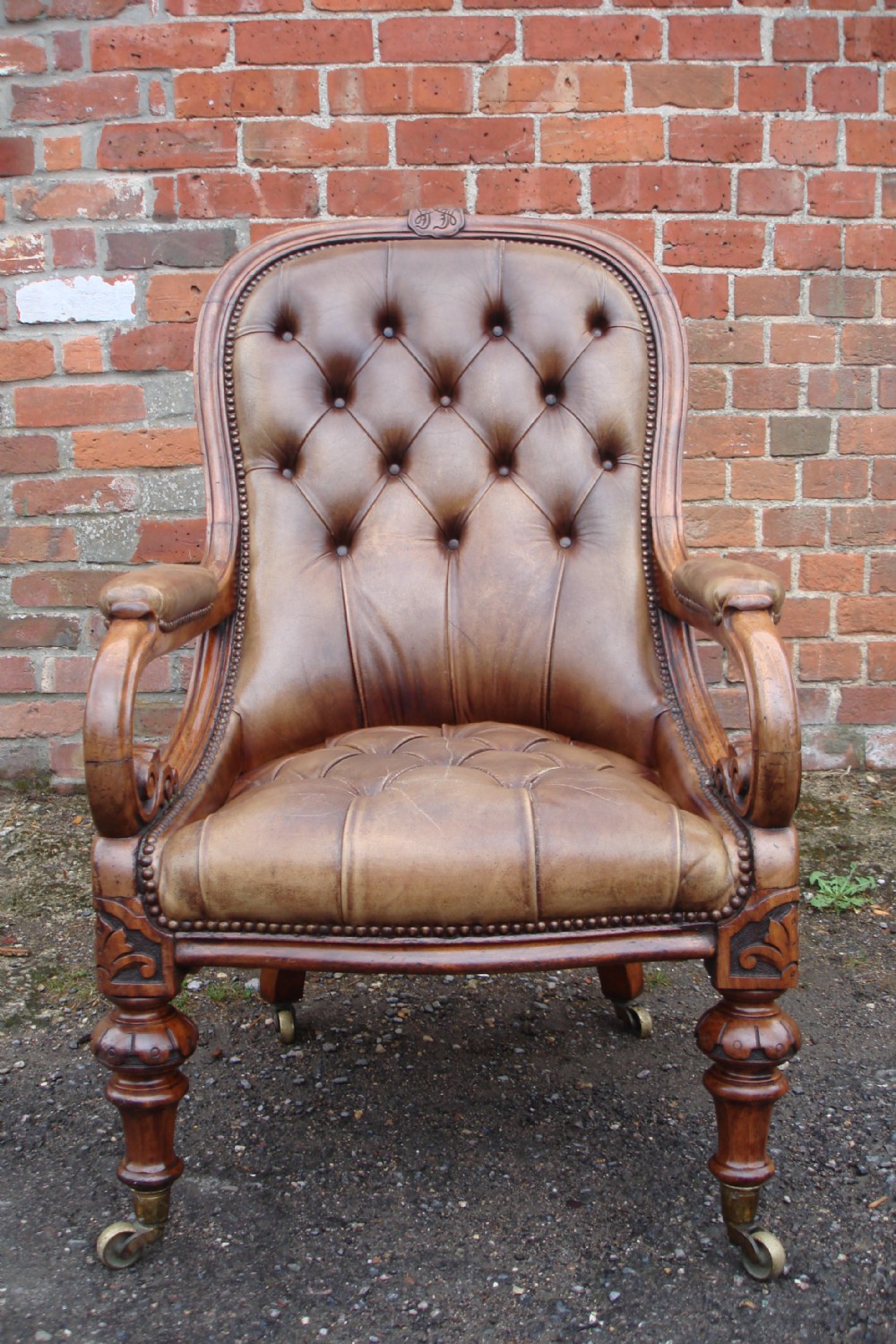 Early Victorian leather armchair