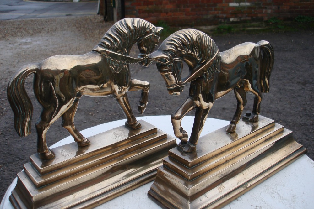 Pair of brass horse doorstops