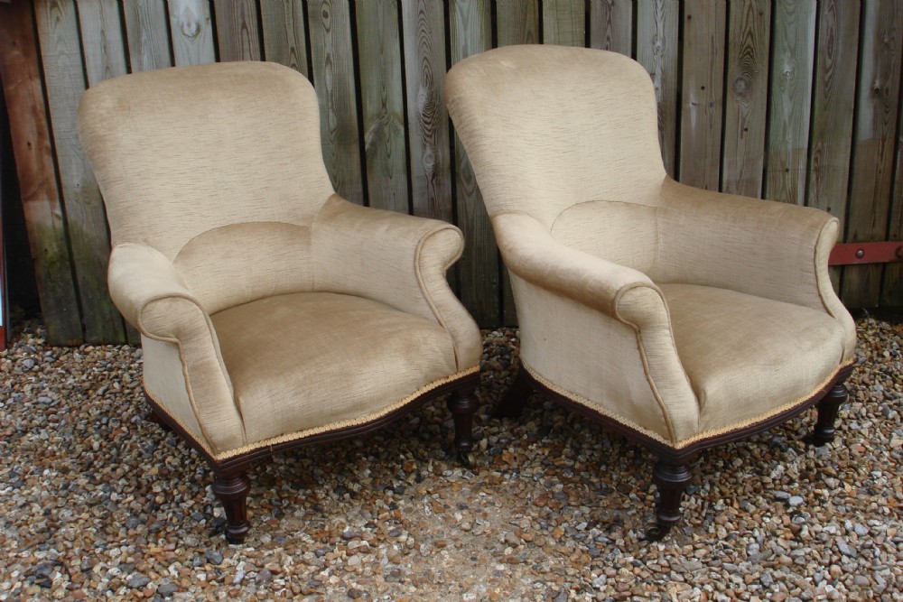 Holland and sons armchairs