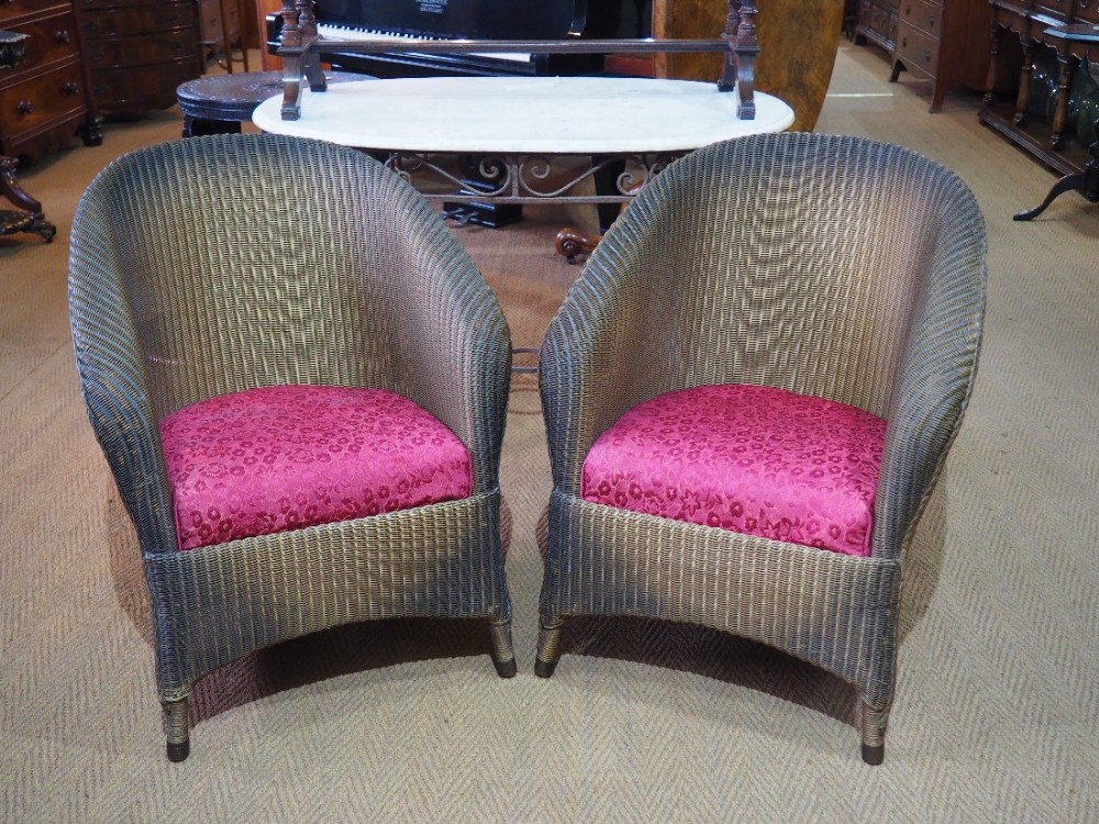 Pair of lloyd loom armchairs