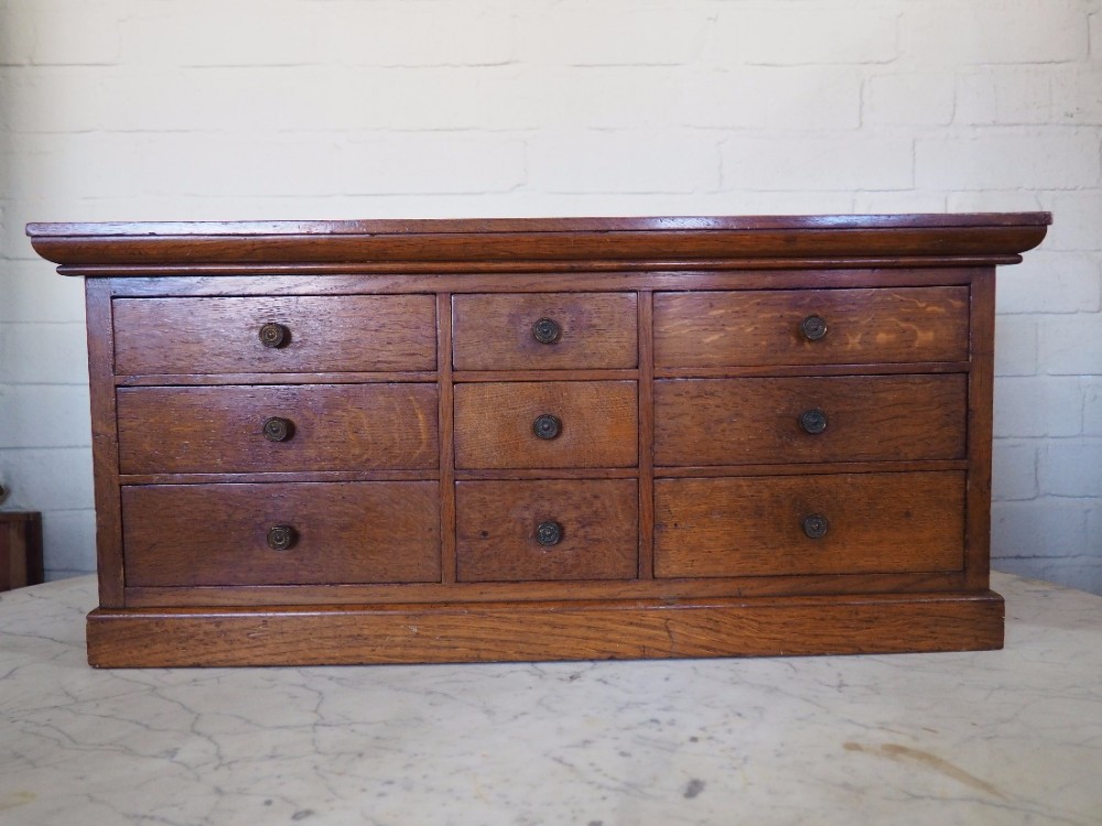 Small oak bank of drawers