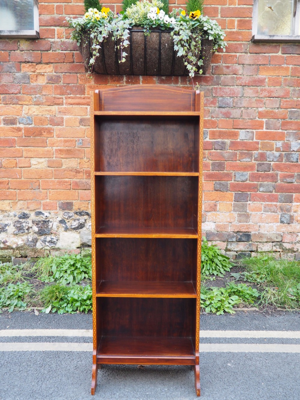 Narrow mahogany bookcase