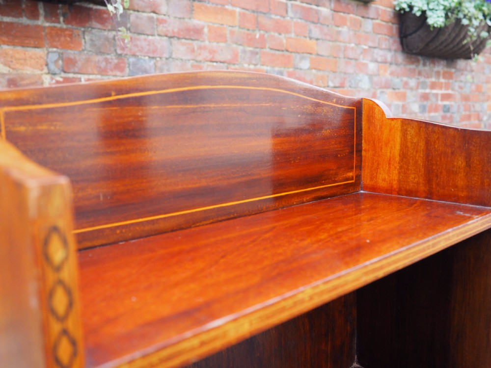 Narrow mahogany bookcase View II