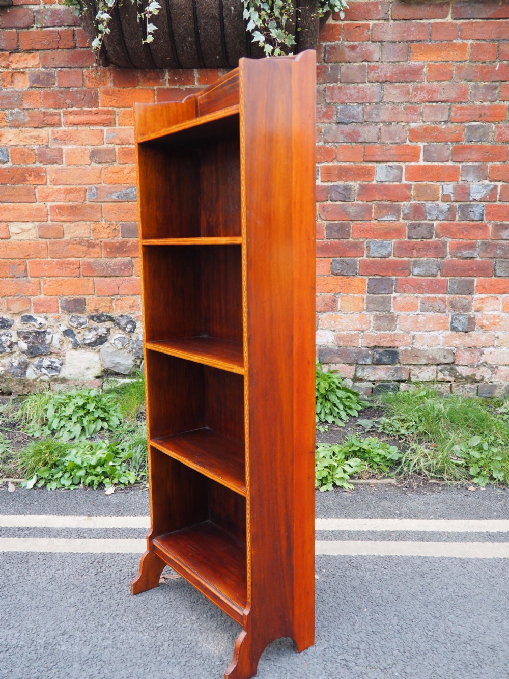 Narrow mahogany bookcase View V