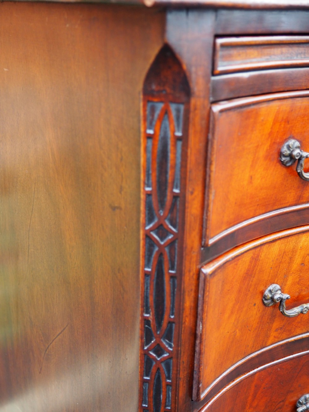 Mahogany serpentine chest View V