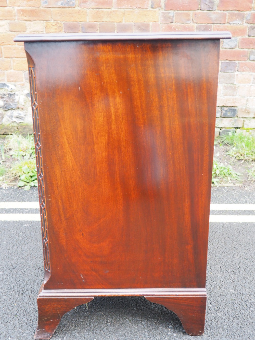 Mahogany serpentine chest View IX