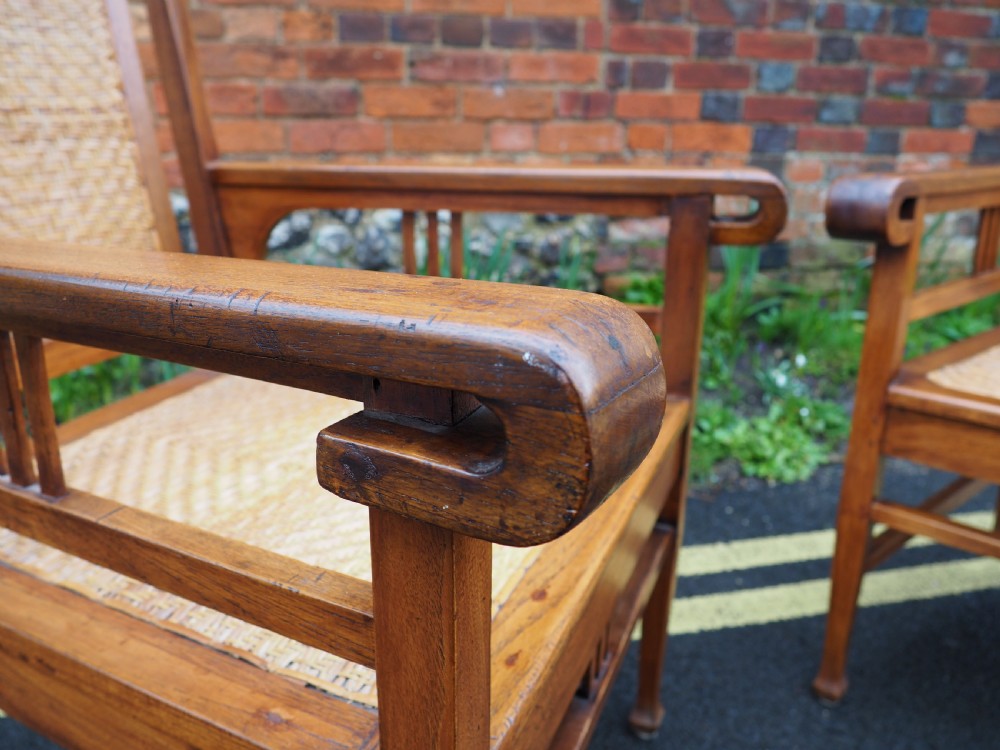 Pair of indian teak armchairs View II