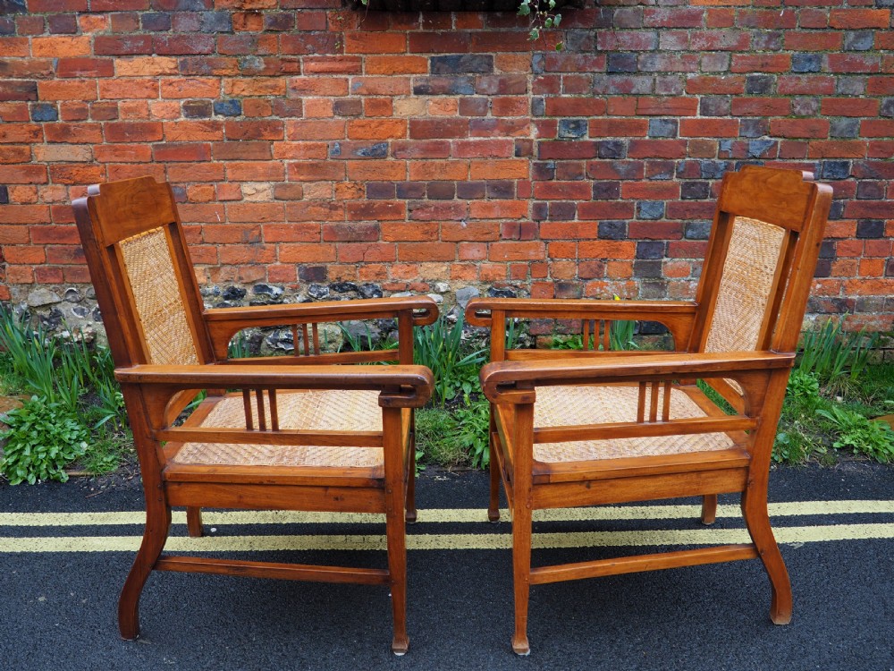 Pair of indian teak armchairs View III