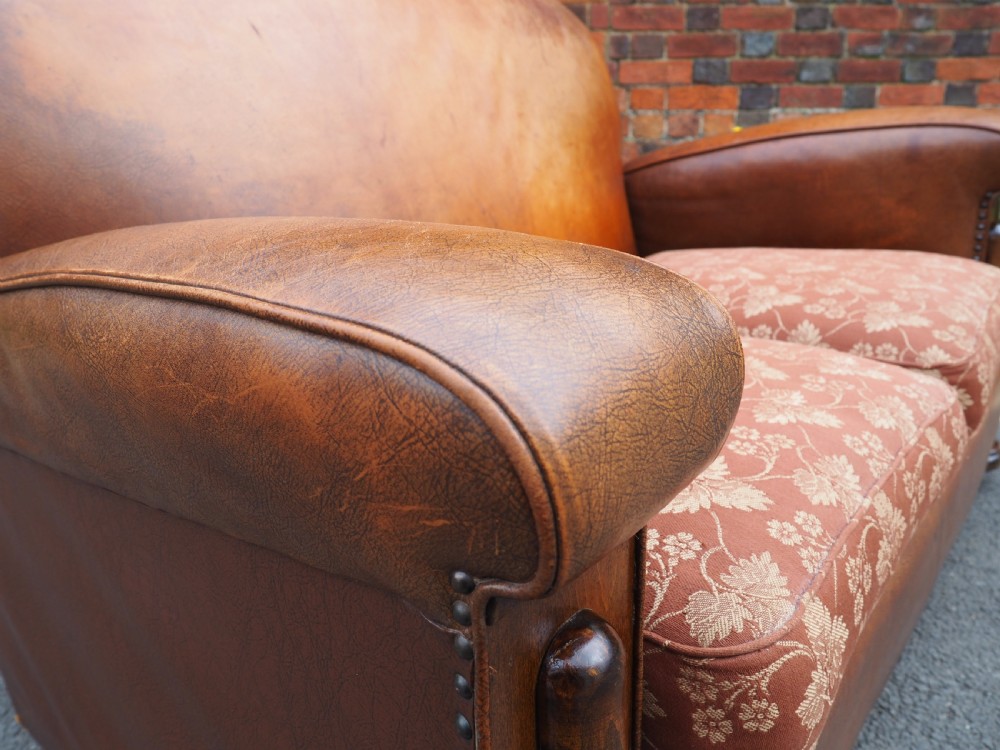 Art deco leather and oilcloth sofa View X