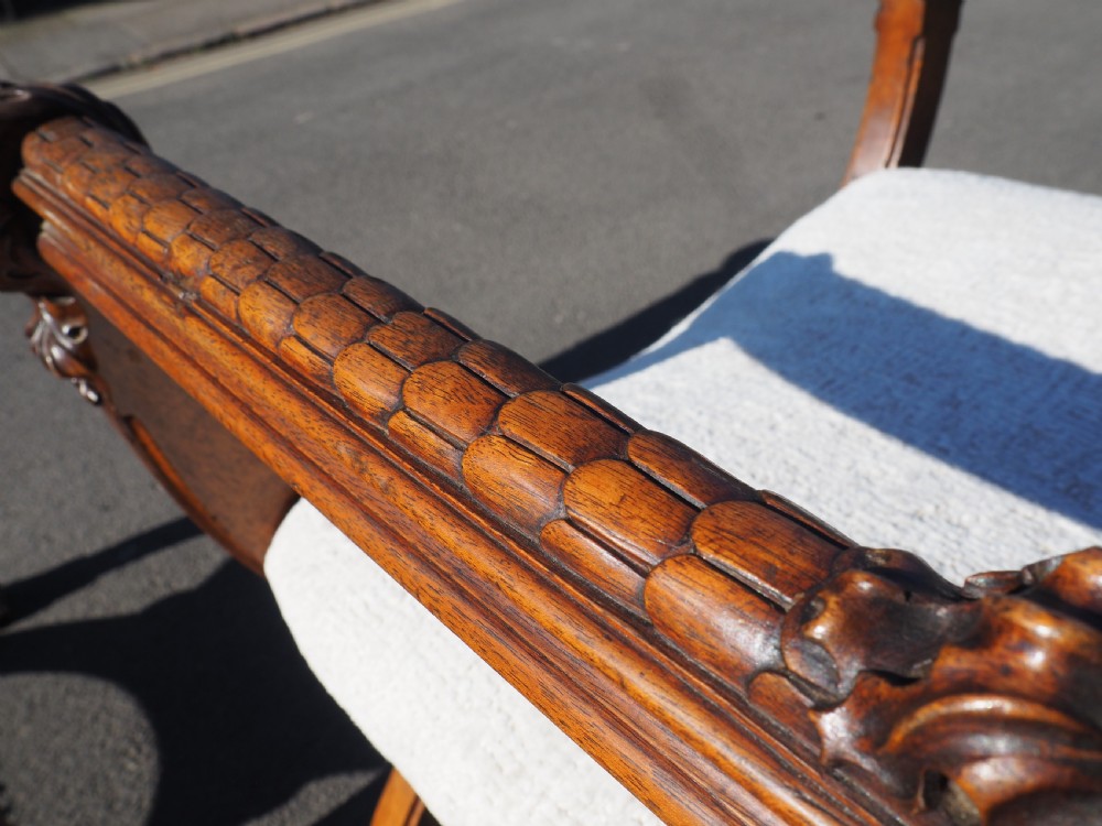 Pair of walnut savonarola chairs View XVII