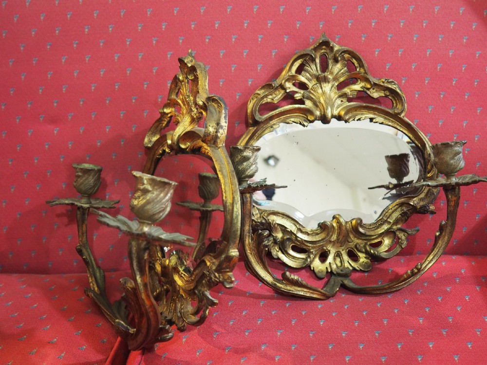 Pair of gilt brass mirrored wall sconces View V