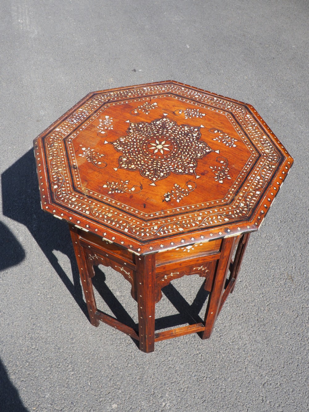 Full size Indian inlaid folding table.