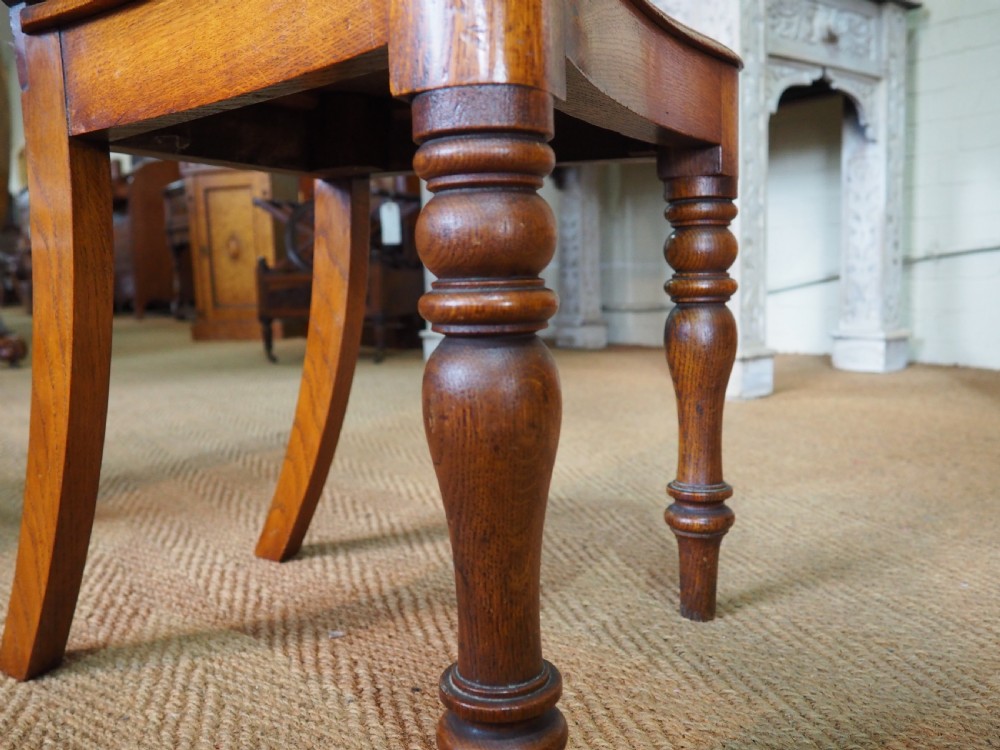 Pair of Oak hall chairs View XI