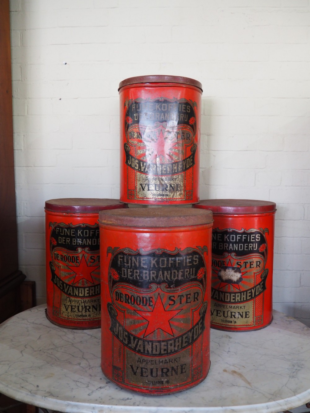 Group of four Belgian coffee canisters