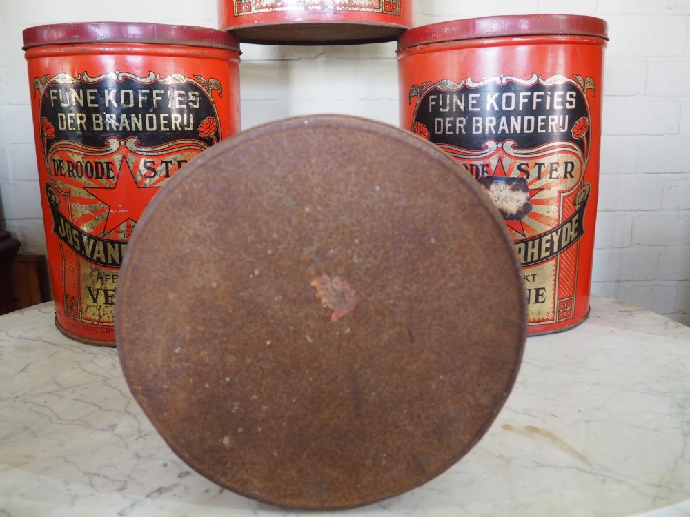 Group of four Belgian coffee canisters View III