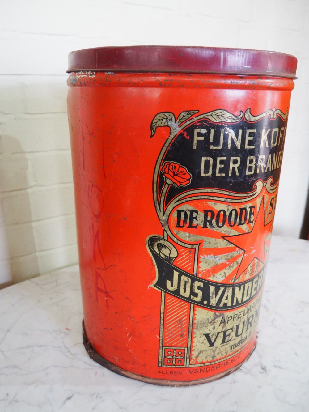 Group of four Belgian coffee canisters View VII