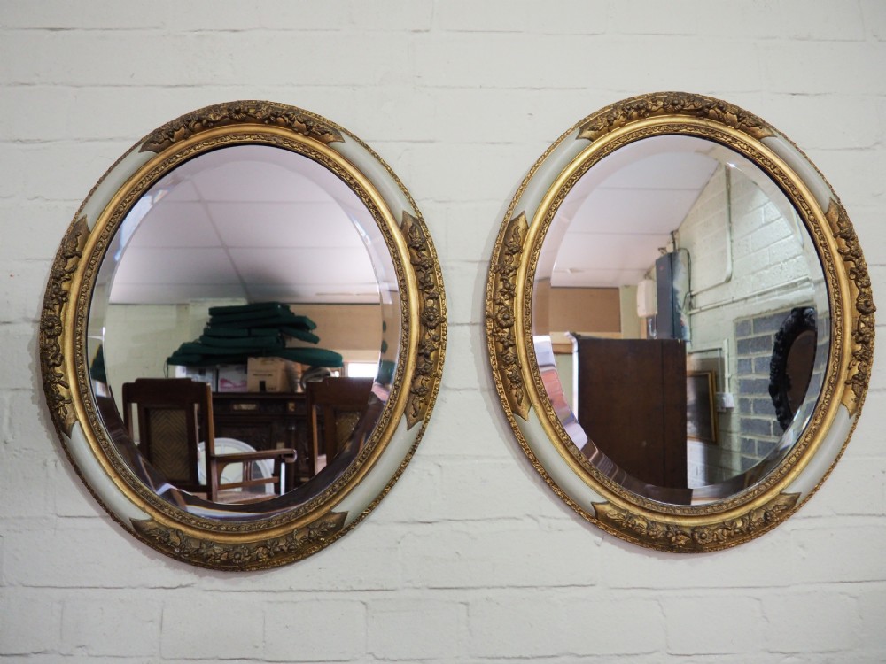 Pair of painted and gilt mirrors