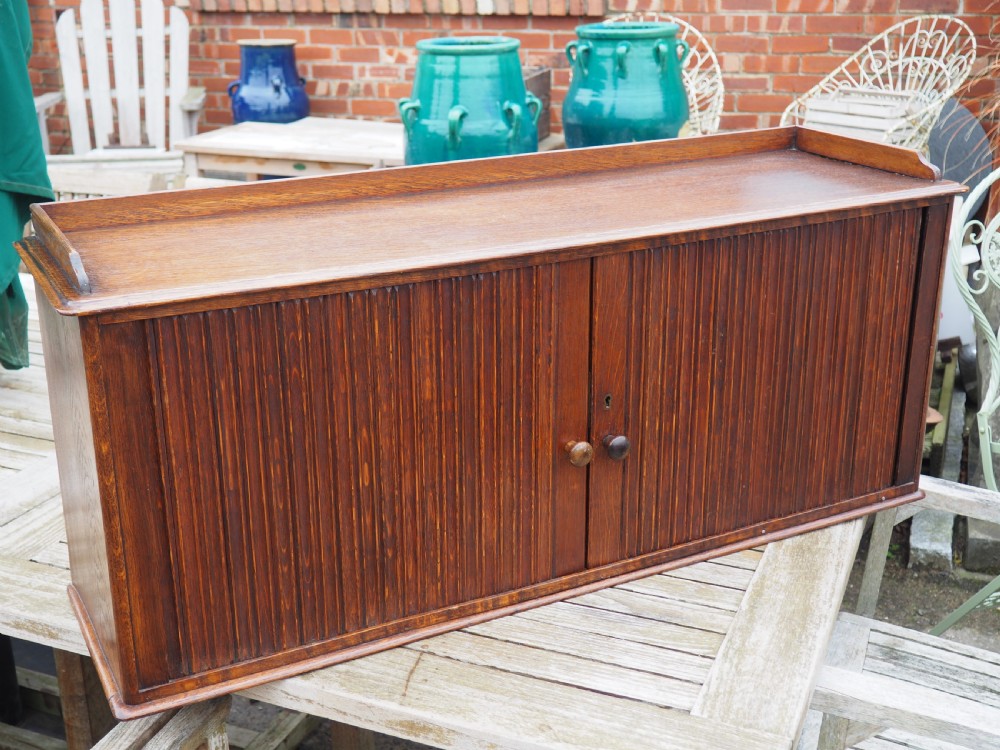 Oak tambour fronted cabinet View II