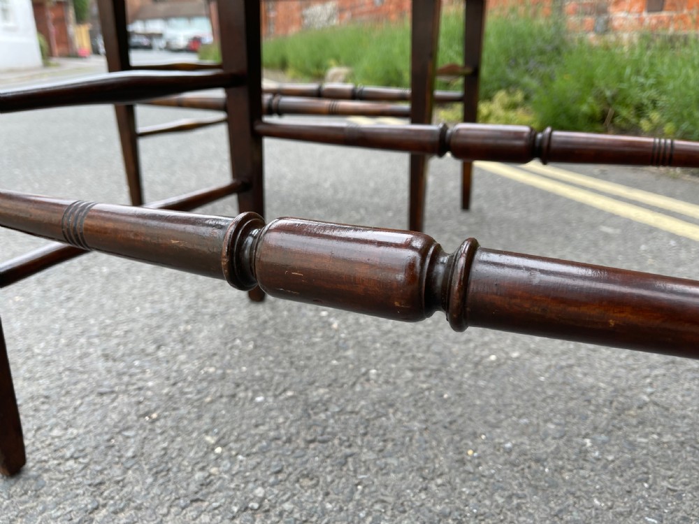 Pair of late Nineteenth century luggage stands  View II