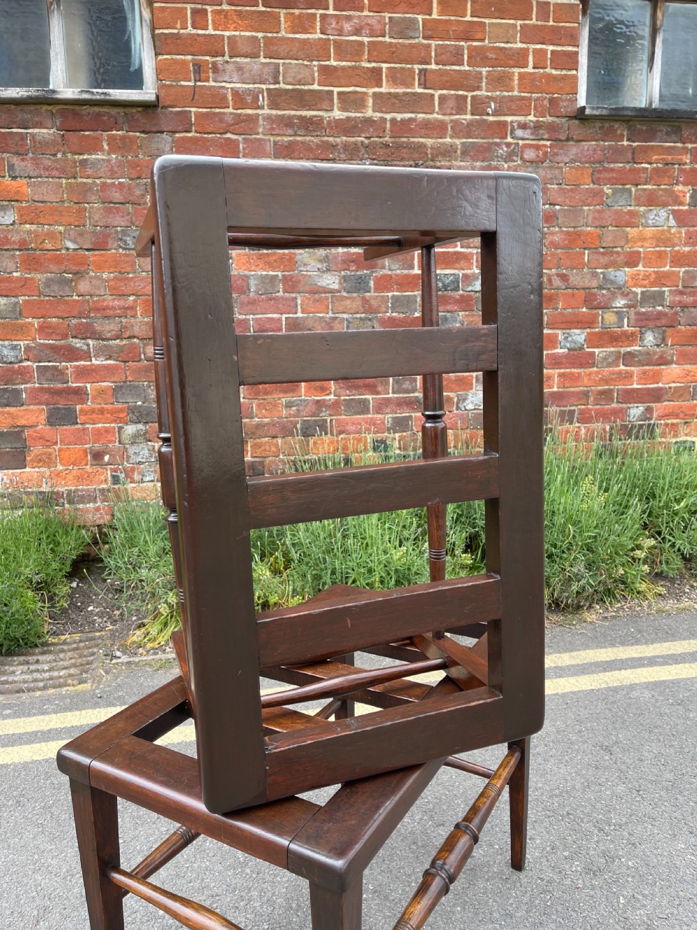 Pair of late Nineteenth century luggage stands  View III