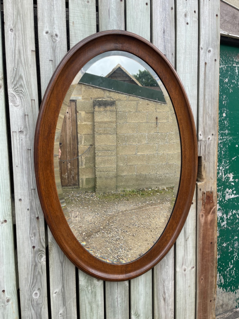 Edwardian oval oak mirror 