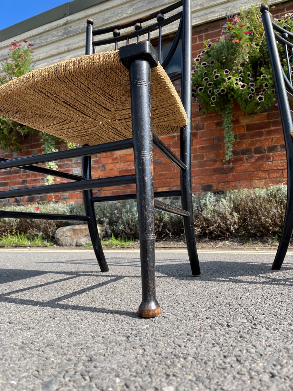 Pair of Heals ebonised Sussex chairs  View III