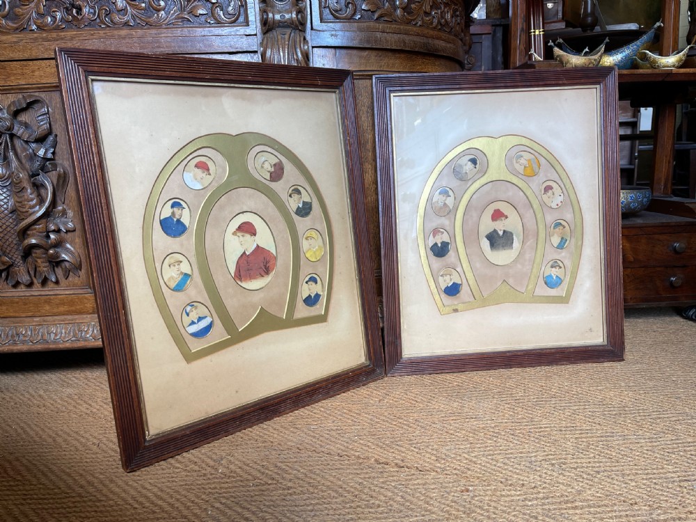 A pair of dark wood framed prints displaying miniature jockey portraits arranged inside gilded horseshoe-shaped matting.