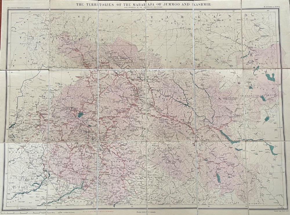 An antique terracotta cloth-bound cover for Thackers Map of Jummoo and Kashmir featuring gilt-embossed lettering and a debossed border. View VI