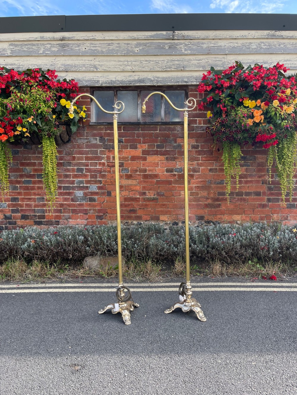 Pair of brass floor lamps 