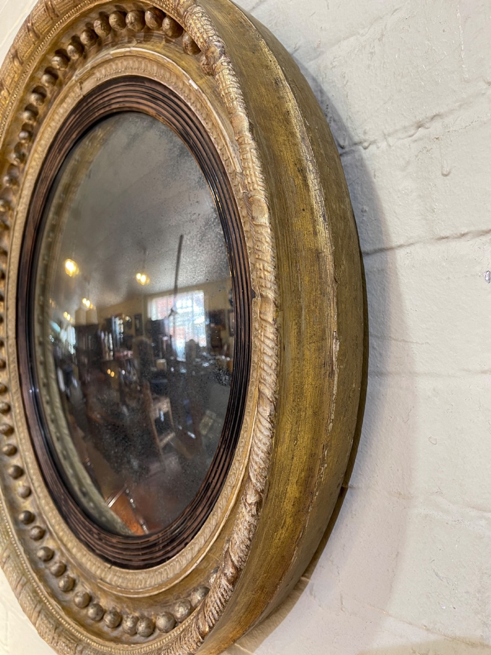 Early Nineteenth Century giltwood convex mirror  View V