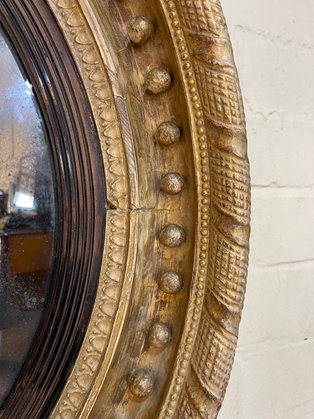 Early Nineteenth Century giltwood convex mirror  View VI