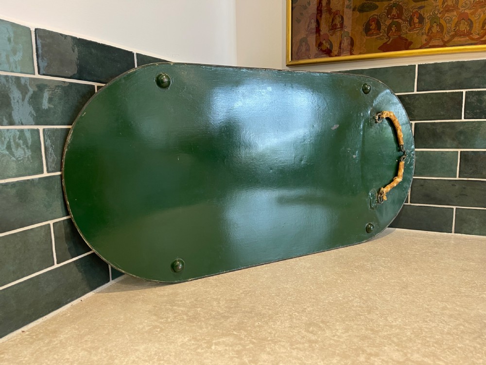 An oblong mirrored plateau tray featuring a decorative clear beaded glass border designed to lie flat on a surface. View II
