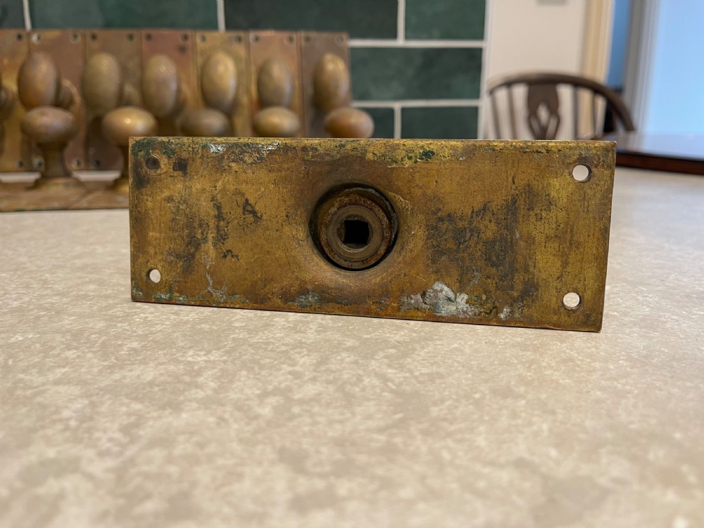 Sixteen brass door handles  View II