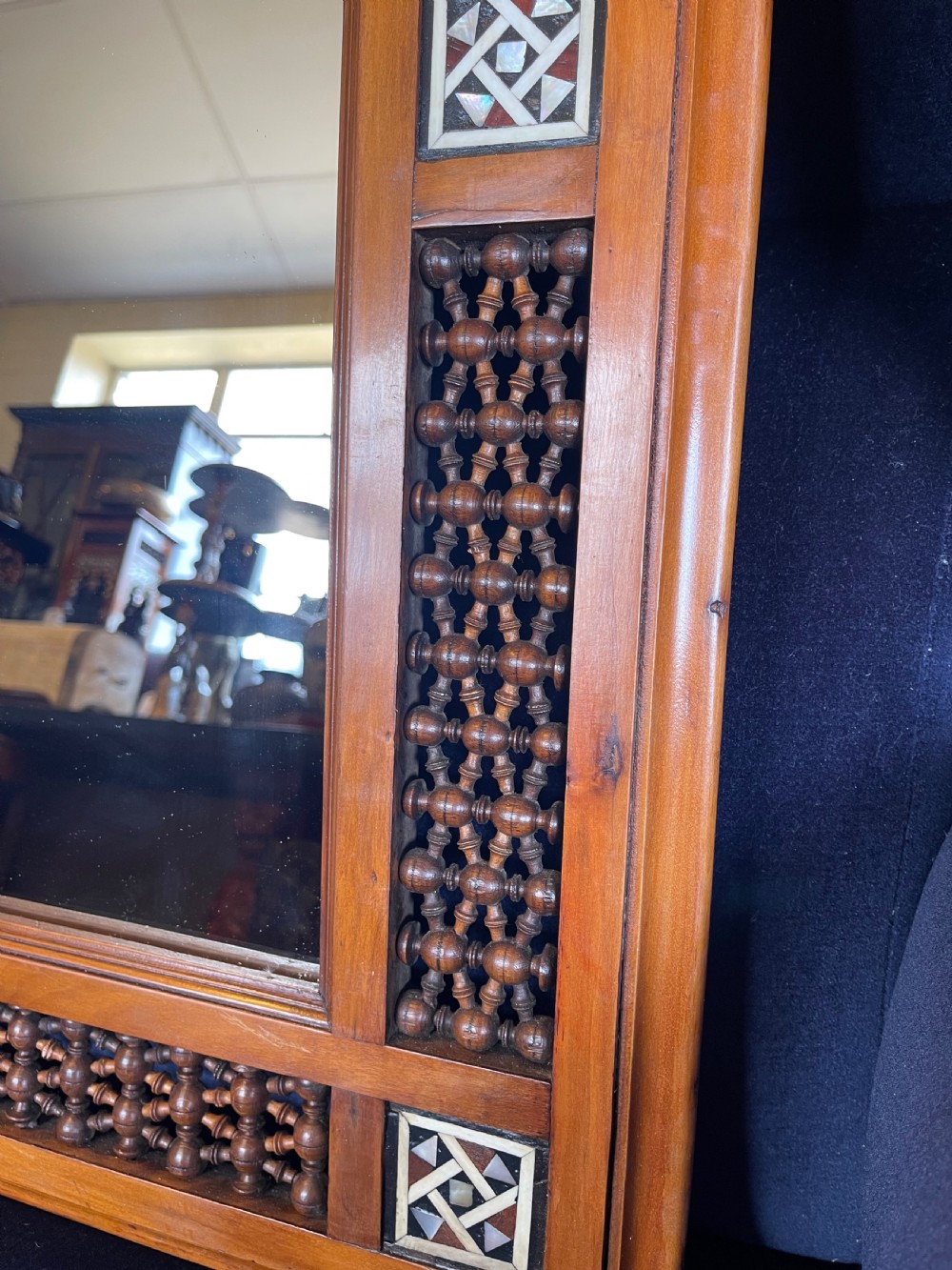A pair of rectangular wooden wall mirrors featuring Moorish lattice panels and geometric bone inlays. View III