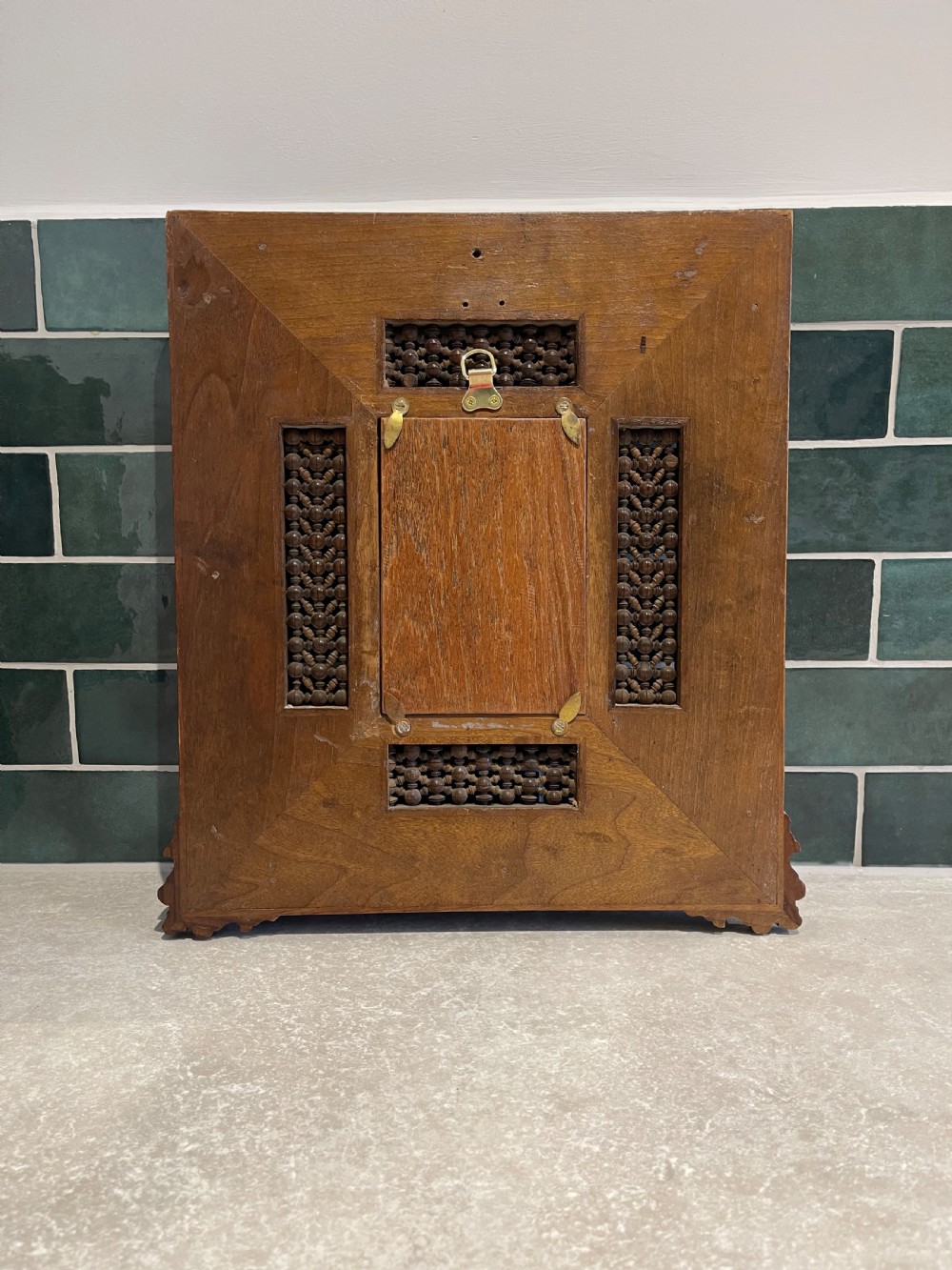A matching pair of dark walnut wall mirrors featuring intricate mother-of-pearl inlay and decorative turned wood lattice panels framing central rectangular mirrors. View III