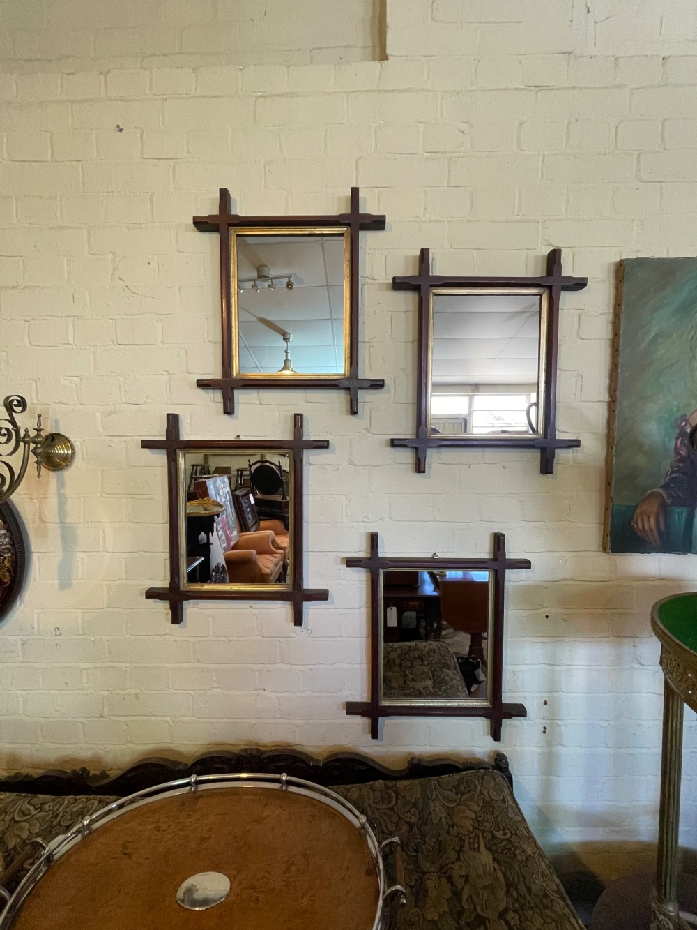 Group of four Oxford framed mirrors 