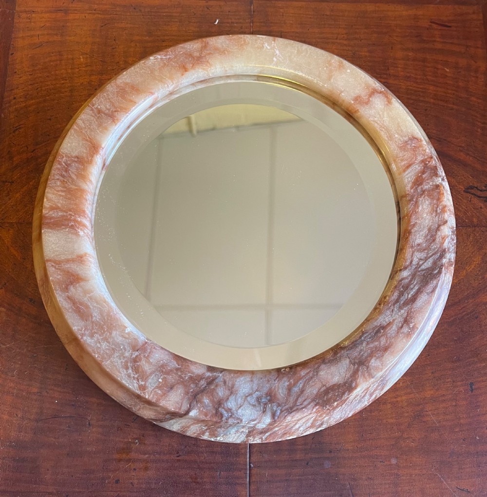 Small Alabaster framed circular mirror 